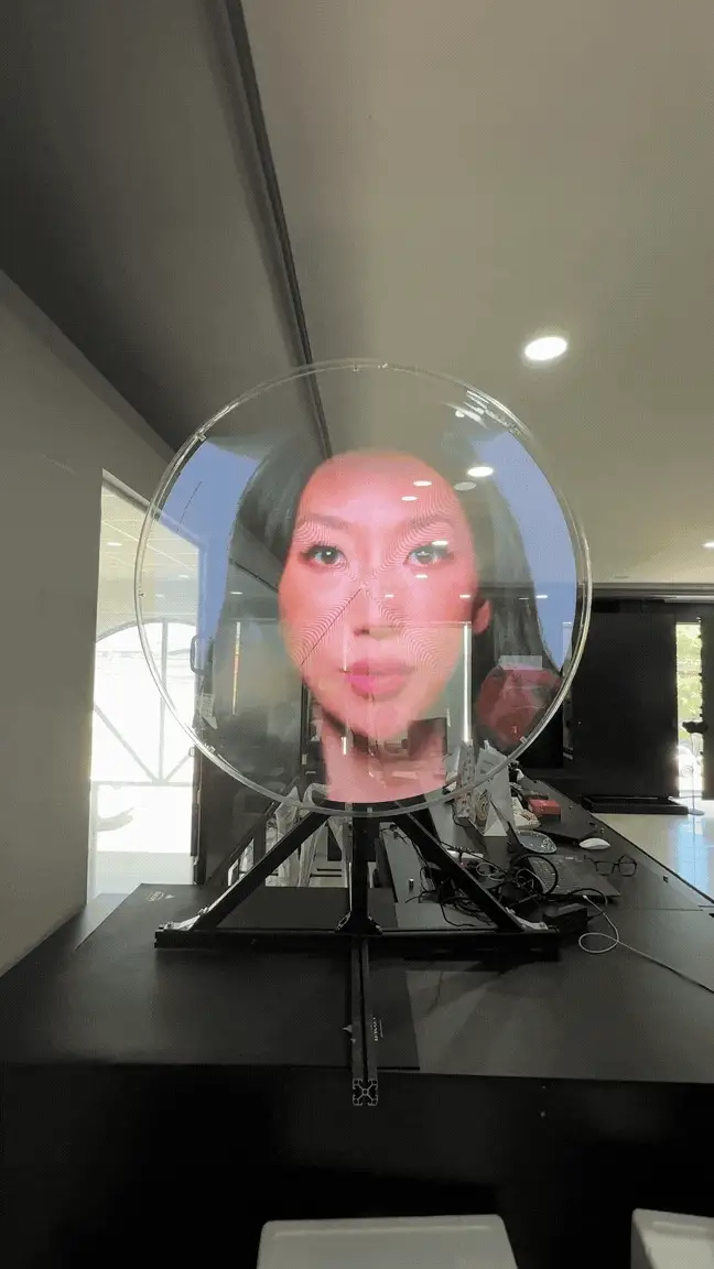 Unit Fan displaying a life-size digital human